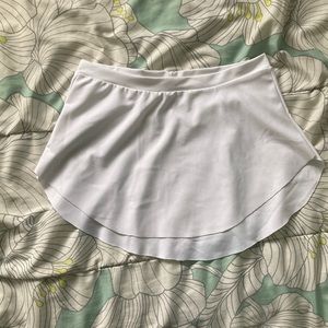 Short bullet pointe style skirt.